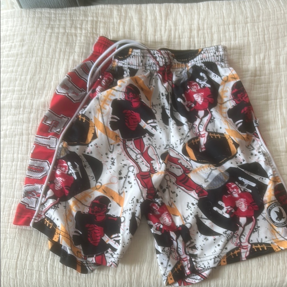 Red and White Athletic Shorts with Dynamic Design